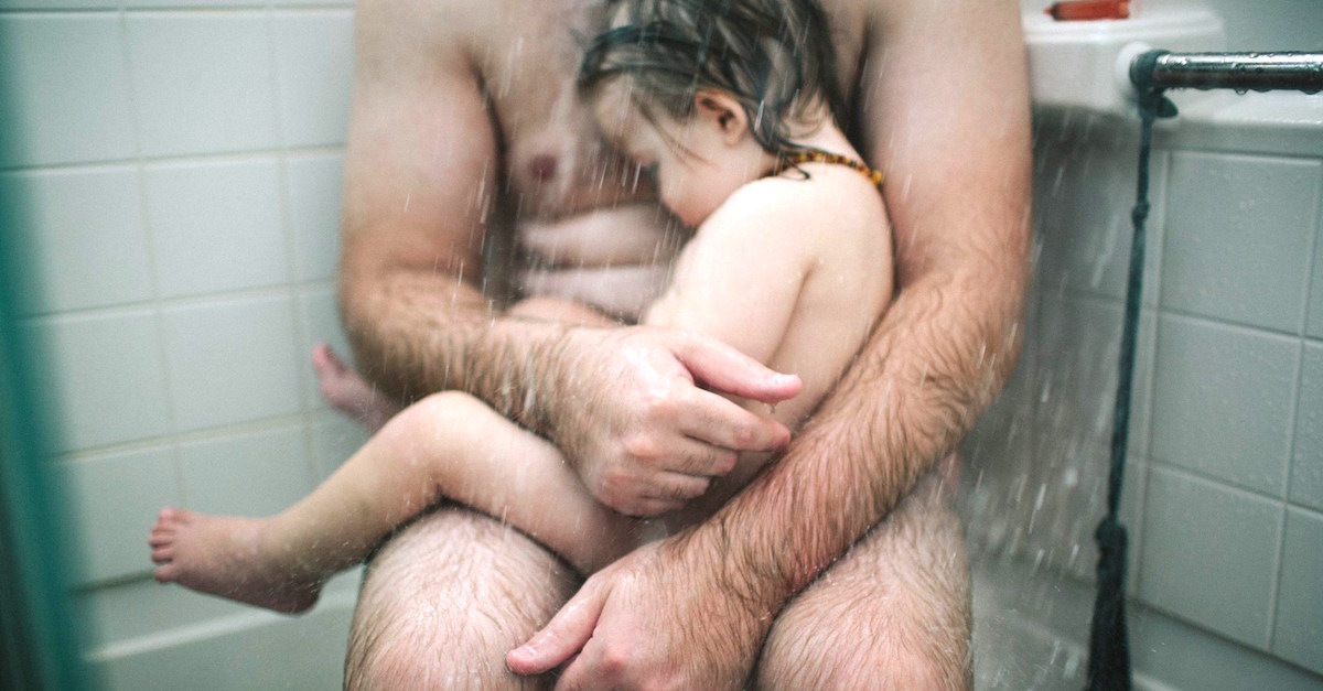 Father Takes Controversial Picture With Sick Baby In The Shower.